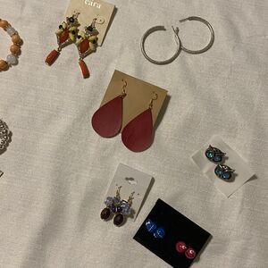 Bundle of seven earrings and 10 bracelets